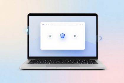 A laptop displaying a white browser window with a blue shield icon in the center. The background is a gradient of pastel pink and blue.