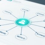 A diagram on graph paper showing a central glowing icon of a person connected by lines to eight circles labeled with text, including "Boan," "VKNRN," and "YCEAP."