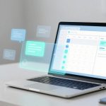 A laptop on a white desk displaying a calendar app with highlighted dates. Floating chat bubbles appear above the keyboard. A smartphone and small plant are nearby.