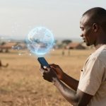 A man stands in a field using a smartphone. A digital globe with network lines hovers nearby. Background has huts and trees.