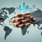 A stack of currency bundles is placed on a world map. A large chain lies broken beneath, and a digital cityscape is faintly visible above.