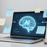 A laptop on a white desk displays a digital brain with "AI" on the screen. Sticky notes with icons and text surround it. Nearby are a coffee cup, a smartphone, and a potted plant.