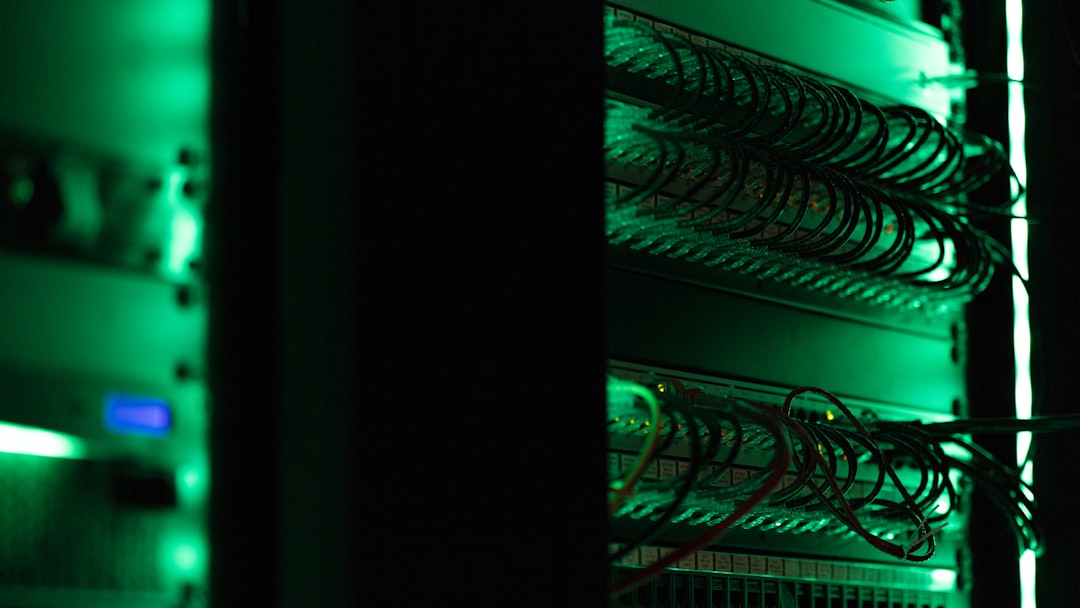 Server rack in a dark data centre, representing the infrastructure compromised in the OpenAI–Hugging Face security incident