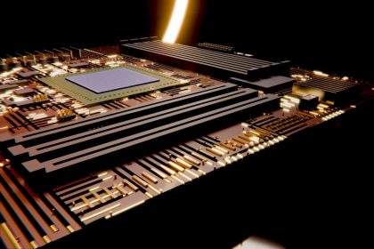 Close-up of a semiconductor circuit board illuminated by warm golden light, symbolising the Qualcomm-AWS AI chip partnership